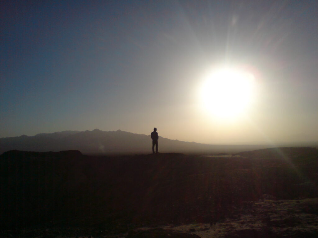 Hazy sandstorm moves in